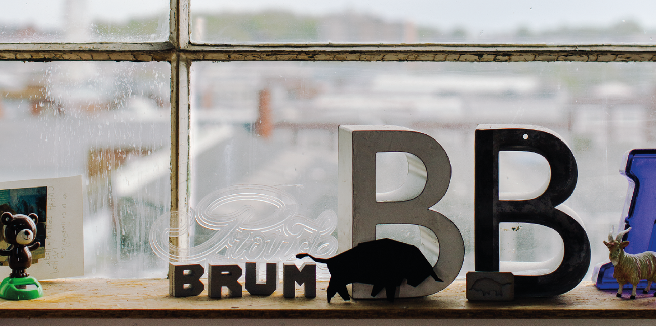 Brumbox studio window with Brum text sculpture