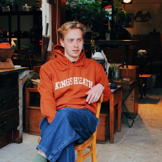 Brumbox Kings Heath athletic varsity style logo chest print in cream on copper hoodie (front)