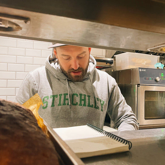 Stirchley athletic varsity style logo hoodie Caneat Cafe Birmingham Food