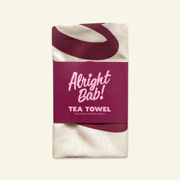 Brumbox Alright Bab cotton kitchen tea towel in packaging (front)